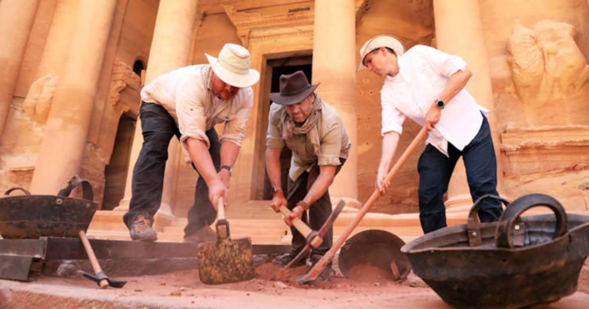 Josh Gates and Pearce Paul Creasman with archaeologist Matthew Vincent, in front of the Treasury at Petra