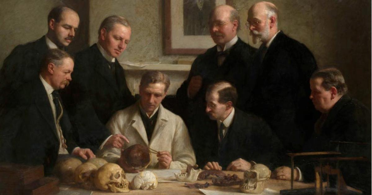 A portrait painted by John Cooke in 1915 showing scientists involved in the Piltdown man case: F. O. Barlow, G. Elliot Smith, Charles Dawson, Arthur Smith Woodward. Front row: A. S. Underwood, Arthur Keith, W. P. Pycraft, and Sir Ray Lankester.