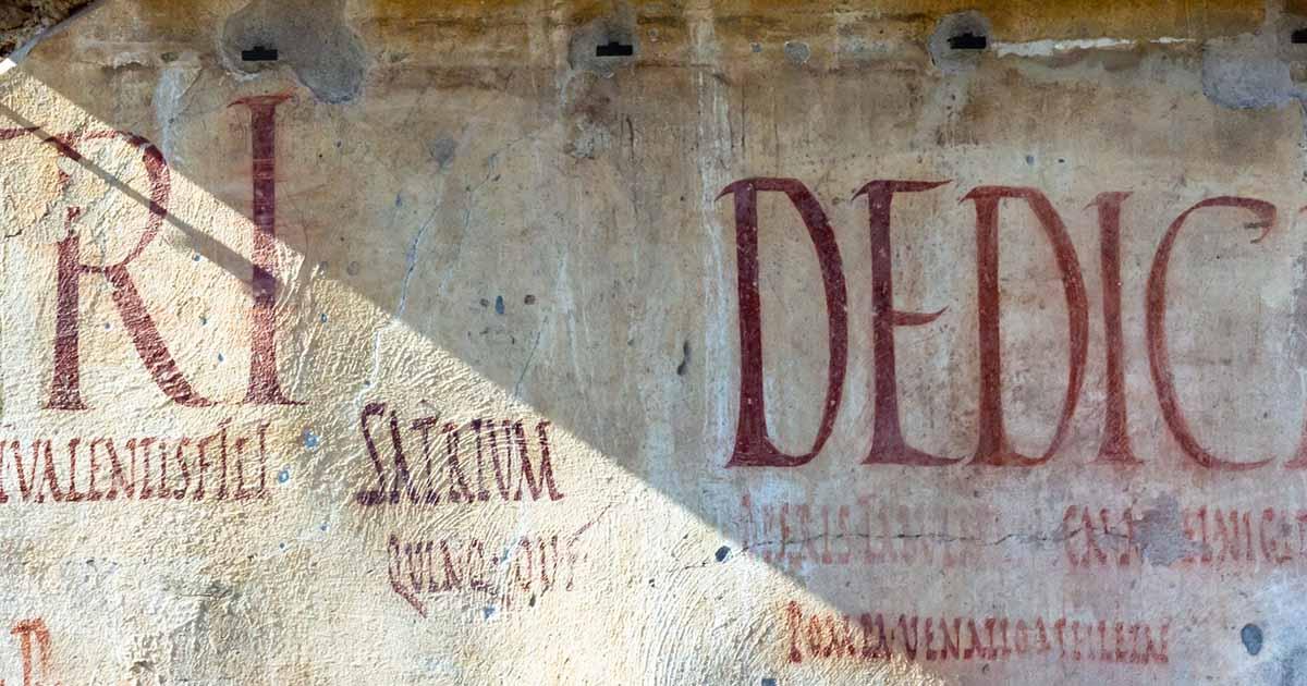 Pompeii graffiti. Source: Niklas / Adobe Stock.