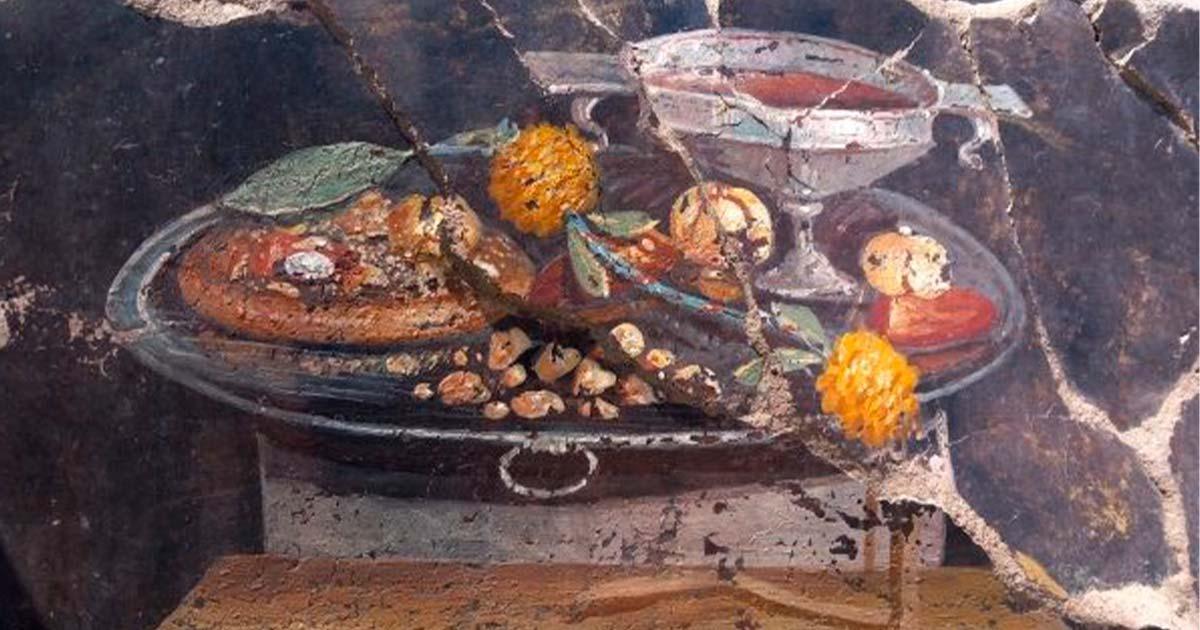 ‘Pompeii pizza’ fresco shows a flatbread with items on top. Source: Parco Archeologico Pompeii