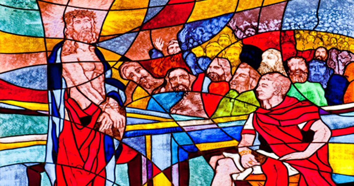 Stained glass image of Pontius Pilot condemning Jesus to death.
