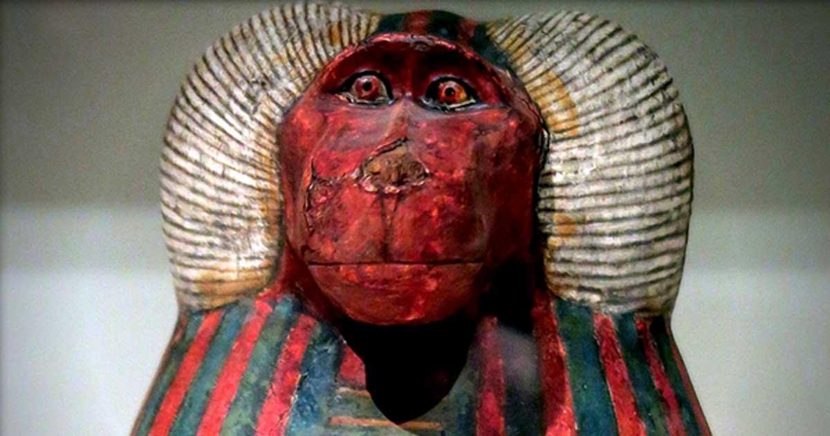 Detail from one of the canopic jars of Padiouf, a priest of Amun, shows the face of the god Hapy; design by Anand Balaj