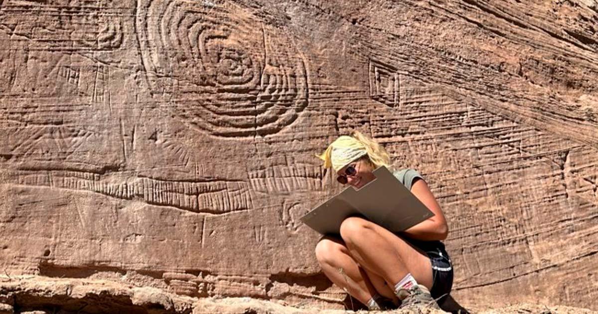 Researcher records pueblo culture petroglyphs found high in Mesa Verde.	Source: Jangiellonian University