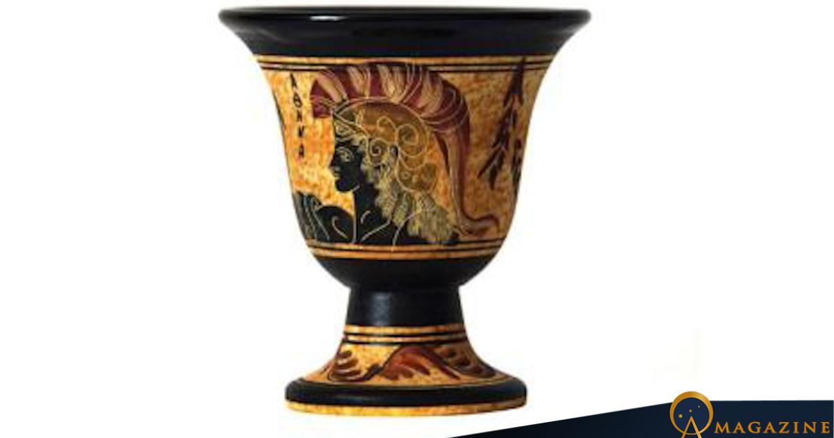 Pythagorean cup isolated on white background.