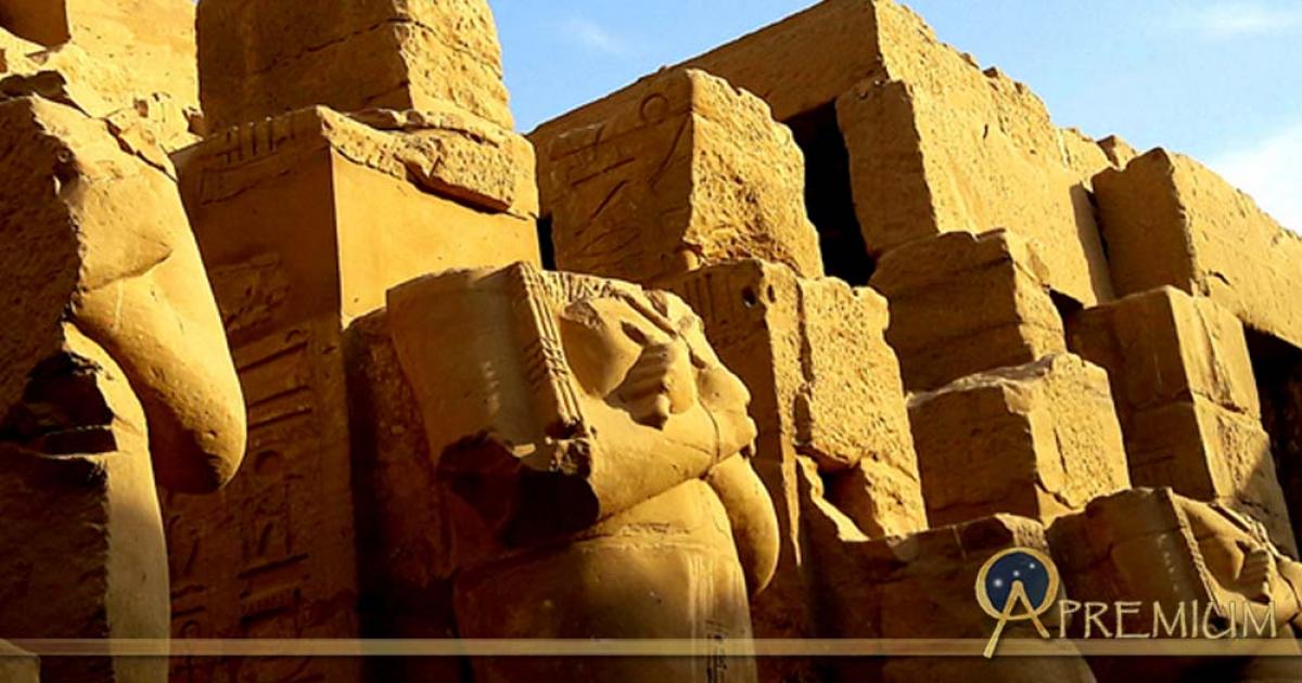 Enormous headless Osiride sculptures of Pharaoh Ramesses III stand in the colonnade of the king's Barque Chapel south of the second pylon at Karnak Temple; design by Anand Balaji (Photo credit: Anand Balaji); Deriv.