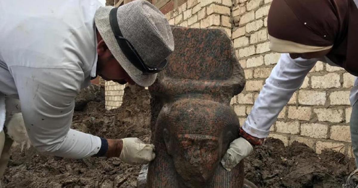 Pink granite statue of Ramses II uncovered in Giza.    Source: Ministry of Antiquities