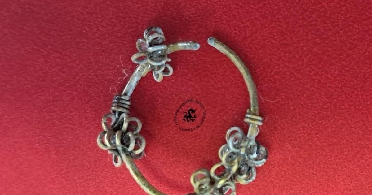 Rare Balkan-style silver temple ring excavated at the Olginsky-10 site in Pskov, Russia