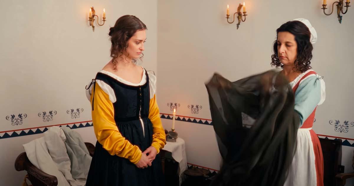 A woman in the Renaissance getting dressed. Source: YouTube Screenshot / CrowsEye Productions.