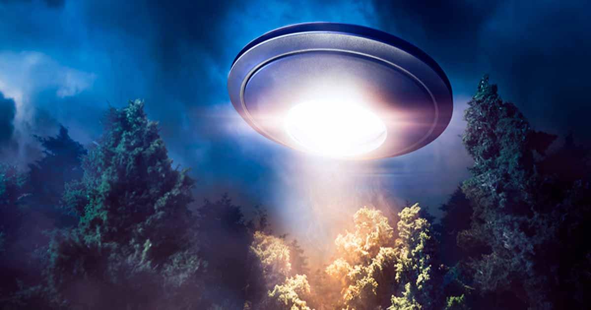 Representational image representing a UFO flying over Rendlesham Forest in Suffolk. Source: fergregory / Adobe Stock