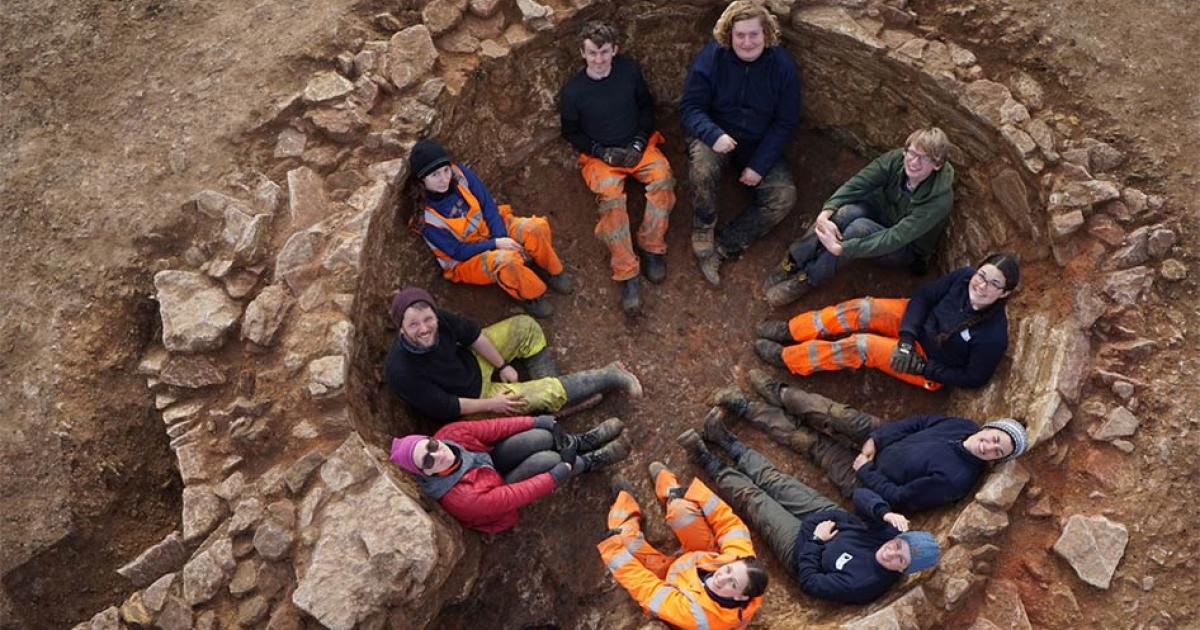 The Oxford Archaeology East team sat inside the lime kiln.    Source: Oxford Archaeology East