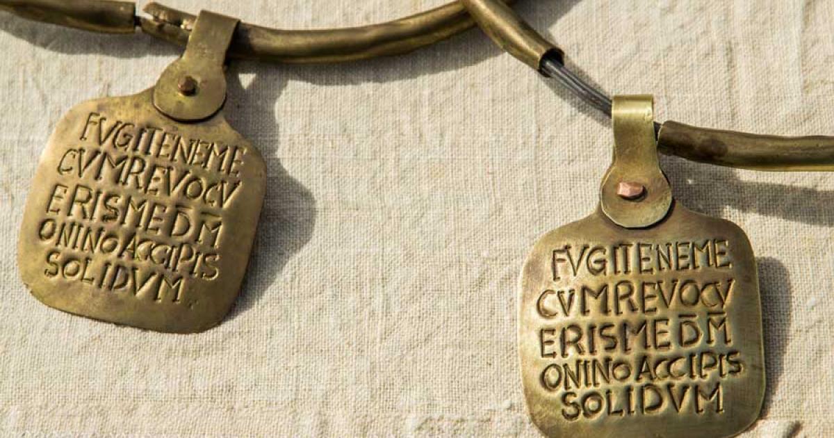 Replica Roman slave collars, after Zoninus. Source: nikhg / Adobe Stock.