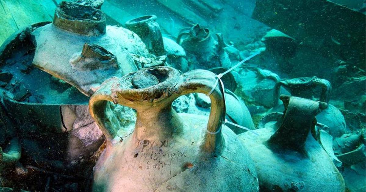 The Roman inscription is still clear on this amphorae recovered with many other well-preserved artifacts from a 4th-century-AD Roman cargo ship found meters from a busy Mallorca, Spain beach in 2019.					Source: Jose A Moya / Arqueomallornauta-Consell de Mallorca, Universitat de Barcelona, Universidad de Cádiz, Universitat de les Illes Balears