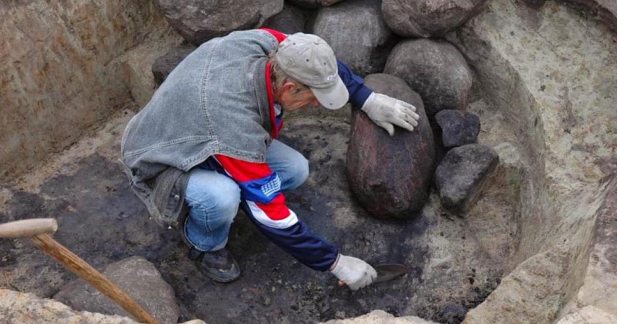 An archaeologist at work in a Roman-era necropolis in Poland 