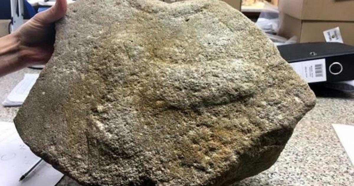 The millstone with an ancient Roman phallus engraving. Source: Highways England