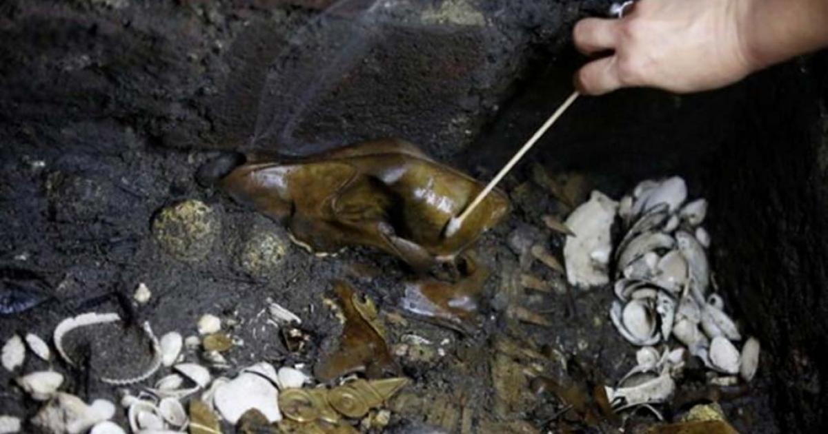 Alejandra Molina, an archaeologist with the National Institute of Anthropology and History (INAH), works at a site where a sacrificed young wolf elaborately adorned with some of the finest Aztec gold has been discovered adjacent to the Templo Mayor, one of the main Aztec temples, in Mexico City, Mexico. 