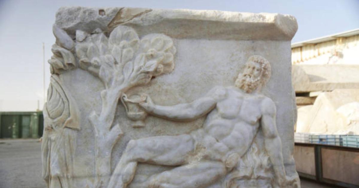 Hercules is represented on the sarcophagus here, reclining in a chair, holding a cup, but no longer able to stand.