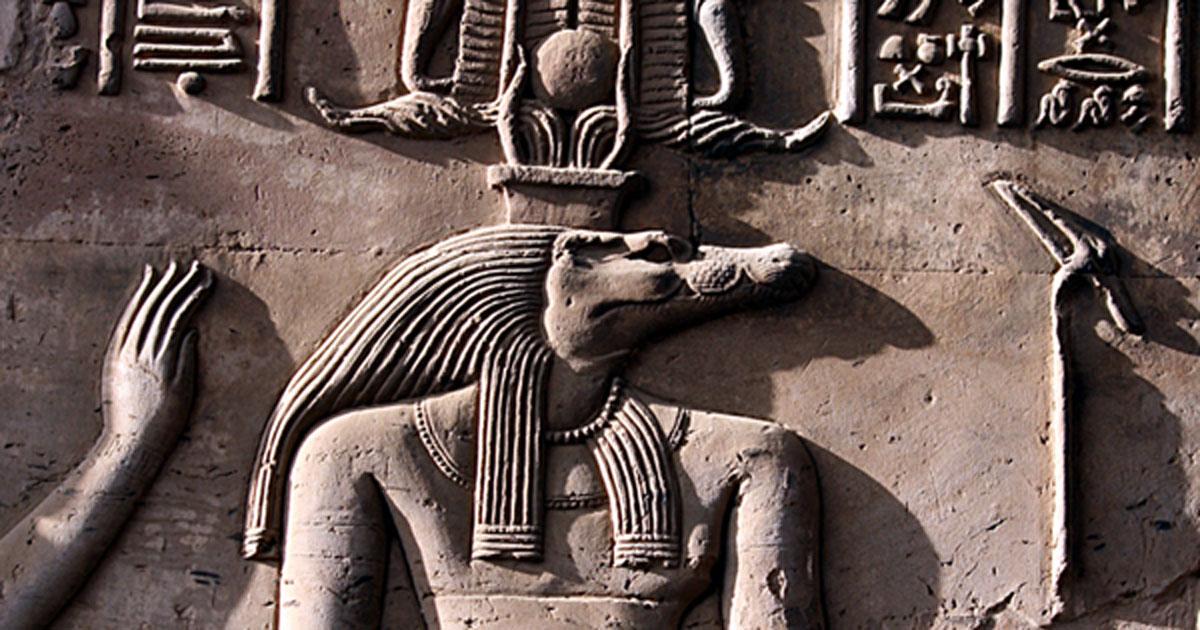 Close up of Sobek as represented on a relief from the Temple of Kom Ombo shows Sobek with typical attributes of kingship, including a was-scepter and royal kilt.  