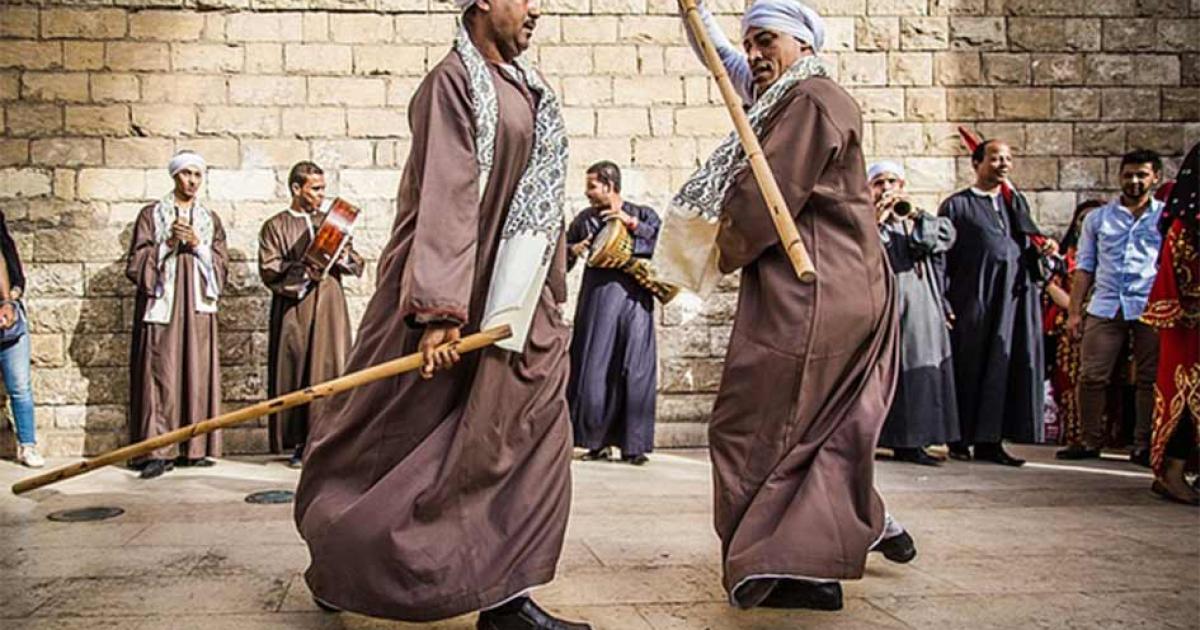 Tahtib dance or ancient Egyptian martial art stick fighting being performed in modern Egypt.	Source: Traditional Sports