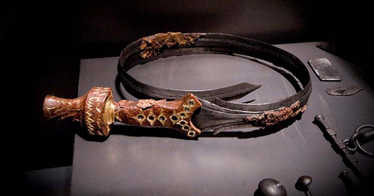 A beautifully decorated bent sword, 826-600 BC, part of the finds in a noble's grave at Oss in The Netherlands.