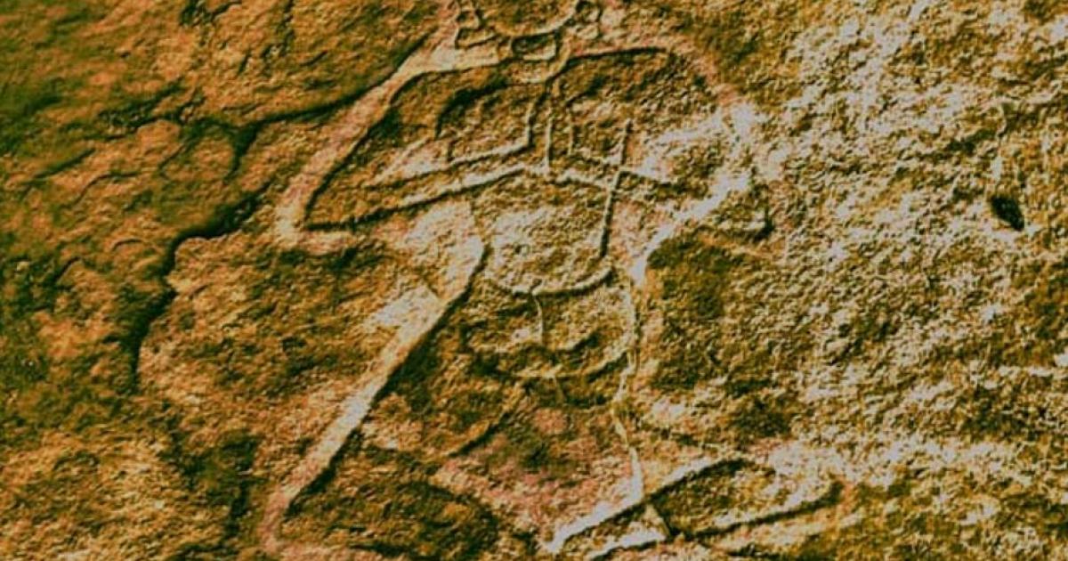 The yogi above the altar was found carved into a rock surface of Kudakumalai Cave near Pudukottai. 