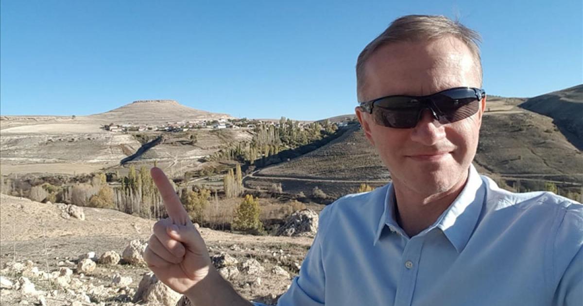 Polish diplomat Robert D. Rokicki points to where he believes the ancient city of Thebasa is located.		Source: Anadolu Agency