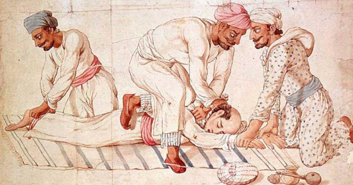 A group of Thuggees strangling a traveler on a highway in India in the early 19th century. Source: Public domain