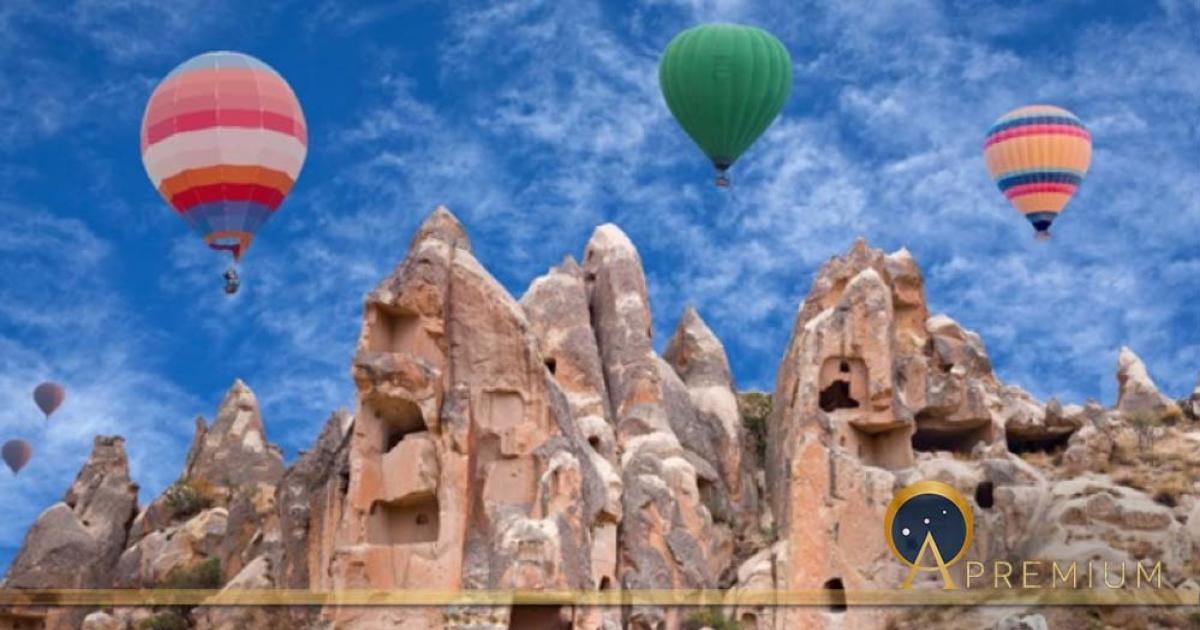 Colorful hot air balloons flying over Red valley in Cappadocia, Anatolia, Turkey (Svetlana Nikolaeva/ Adobe Stock)