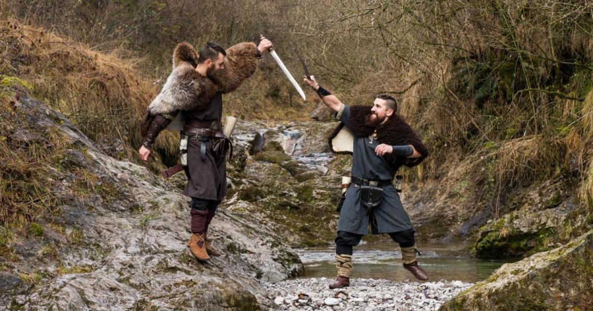 Two Viking re-enactors fighting