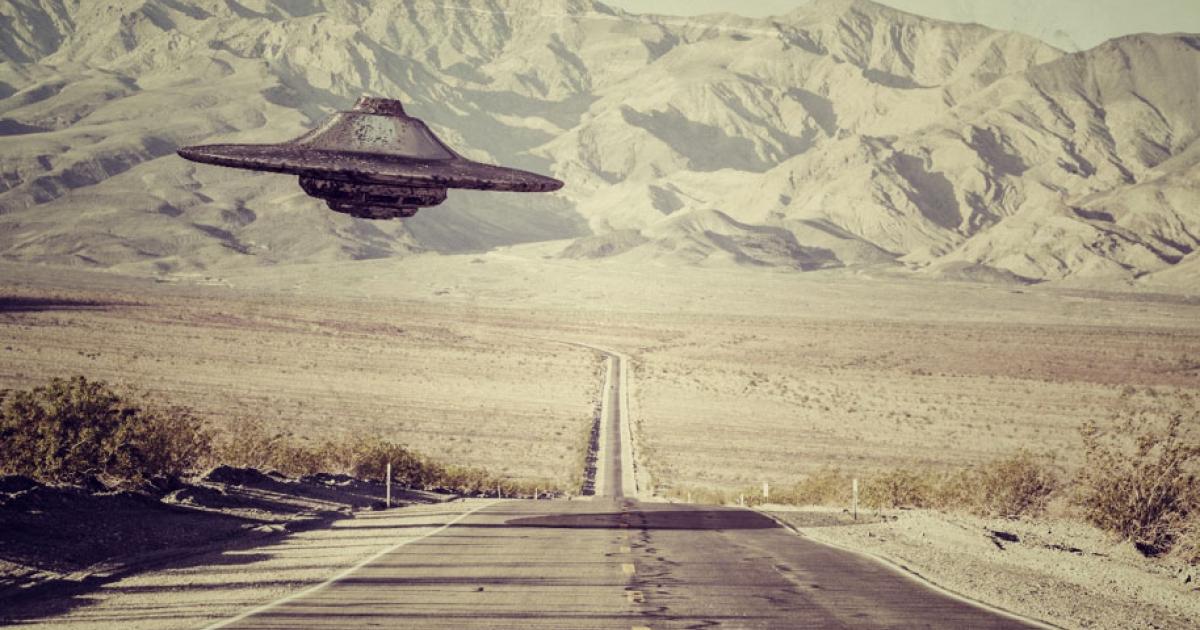 A UFO flying over the New Mexico desert. 