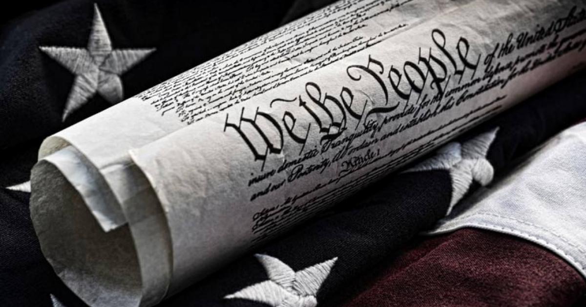 United States constitution and flag
