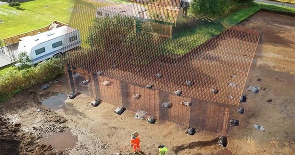 The site of the newly discovered rare ancient Viking temple found in Norway with an imagined reconstruction of the actual building.   Source: University Museum of Bergen