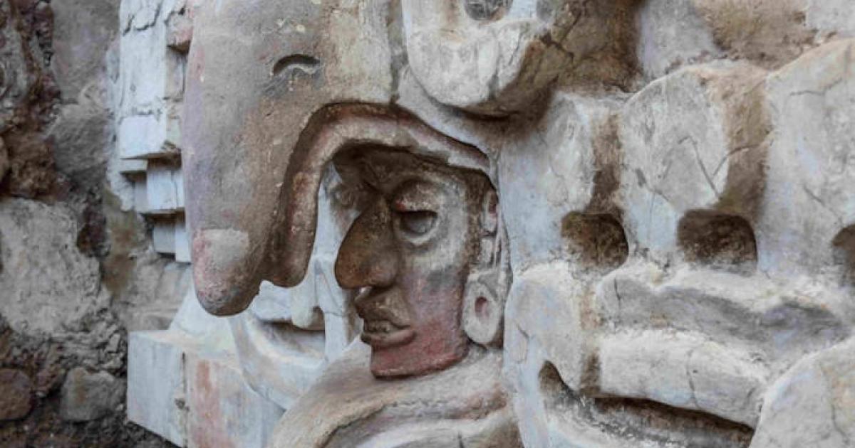 Close up of owl beak over a face above the entrance to the Zapotec tomb found in Mexico