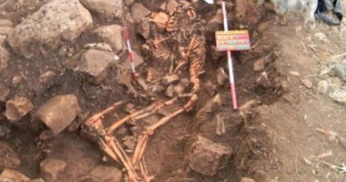 A rare ancient Greek gravesite containing two intertwined corpses