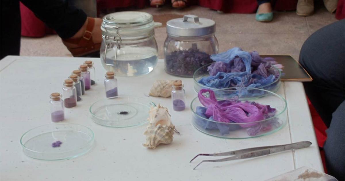 Mohamed Ghassen Nouira holding textile fragments made with his ancient purple dye using Murex sea snails from Tunisia.    Source: Mohamed Ghassen Nouira