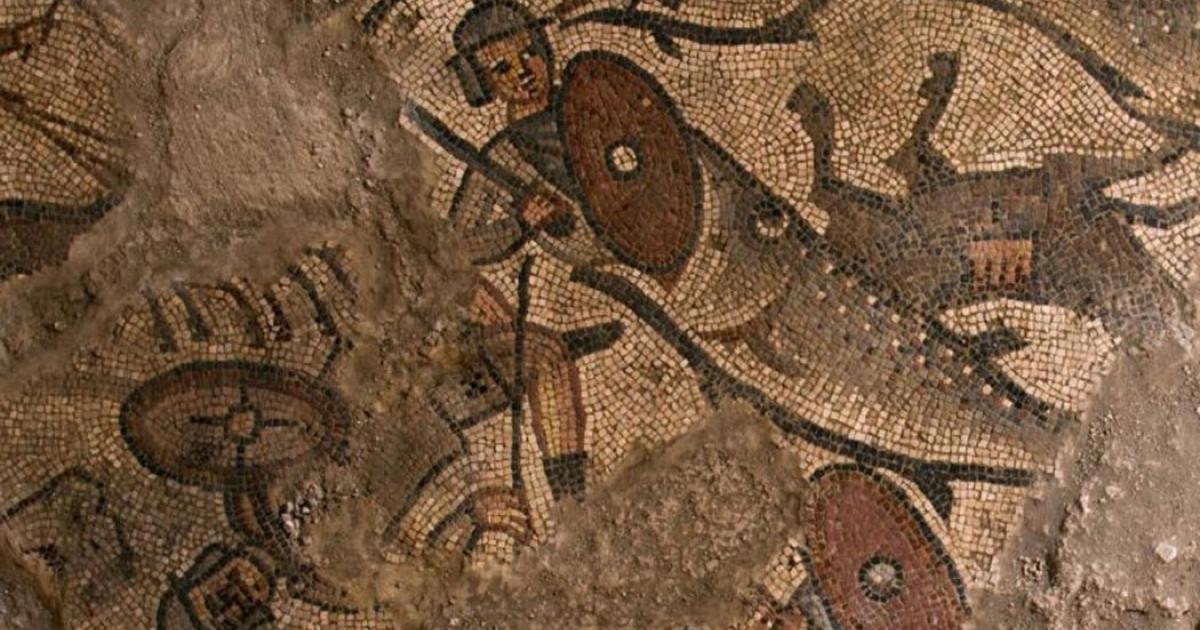 A big fish swallows an ancient Egyptian soldier on one of the mosaics found on the floor of the synagogue.