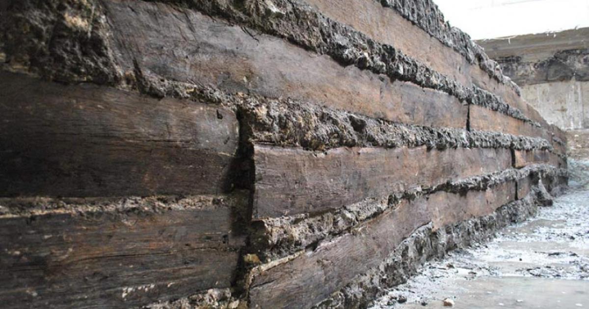 Some of the oak planks unearthed in the foundations of the portico. These planks are an example of those used for building Rome.      Source: Soprintendenza Speciale Archeologia, Belle Arti e Paesaggio di Roma, Italy