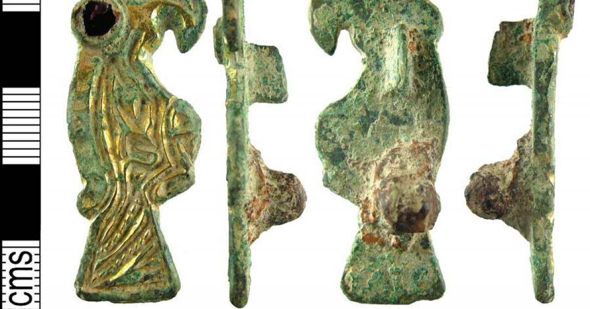 An incomplete early early-medieval (Anglo-Saxon, 500-600 AD) gilded copper-alloy zoomorphic plate bird brooch with garnet eye detail, missing its pin. This type of brooch was found in many medieval furnished graves across Kent and the Frankish world. But after 600 AD European burial rites transitioned to unfurnished churchyard burials, according to the latest study.	Source: Hampshire Cultural Trust