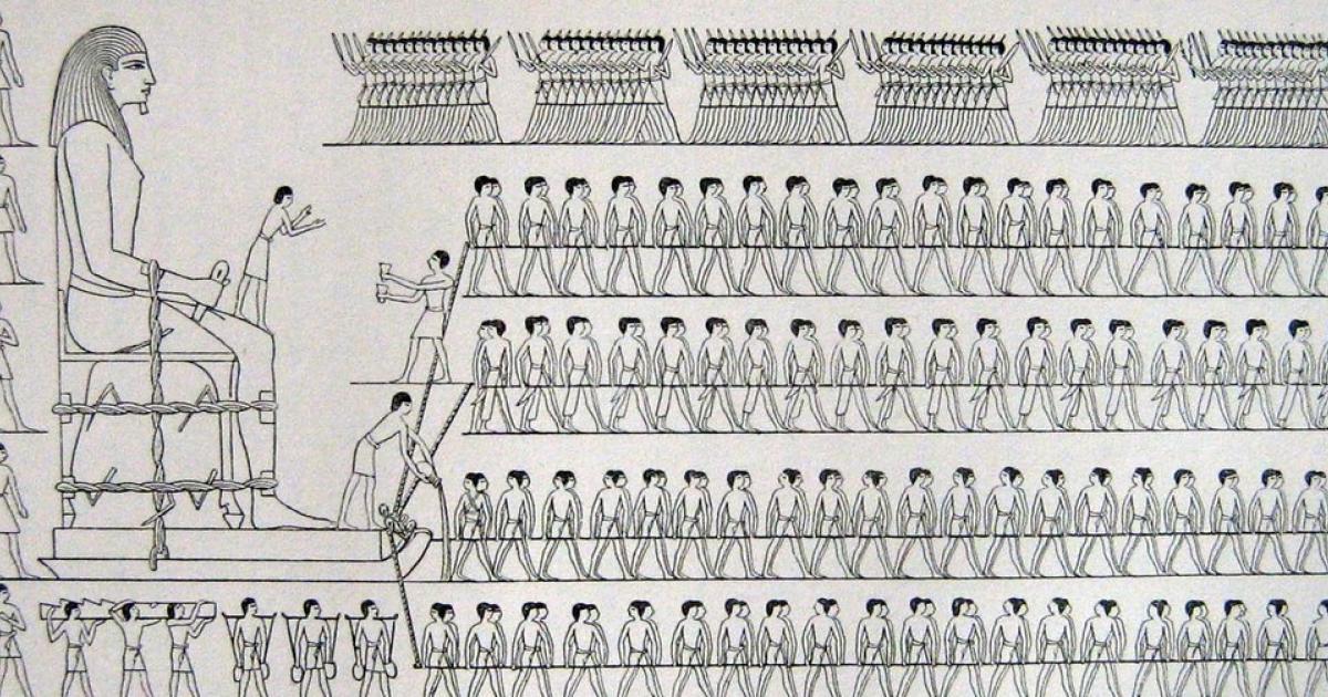 Nineteenth-century drawing of long teams of men hauling a colossal seated statue on a sledge, from the tomb of Djehutihotep at el-Bersheh