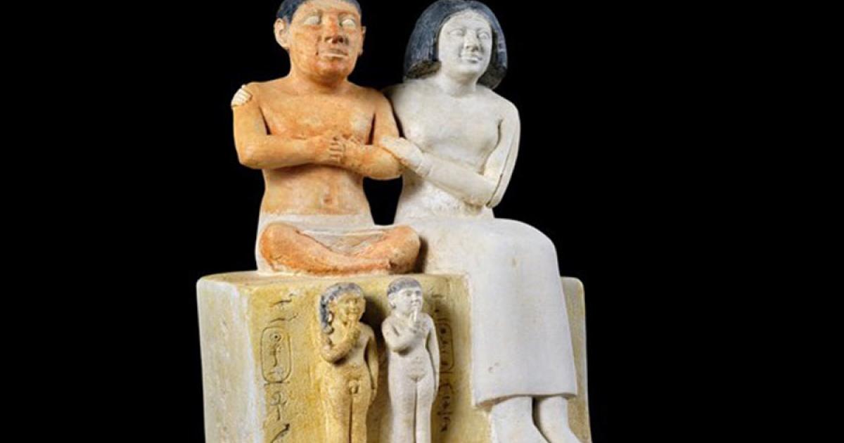 There is much evidence of dwarfs in Egypt. Here, a group statue of the dwarf Seneb and his family at the Egyptian Museum in Cairo. The statue was found in a naos in his mastaba tomb in Giza. Seneb is represented seated, with his legs crossed, beside his wife who embraces him affectionately. His wife is of regular height. 	Source: Ministry of Tourism and Antiquities