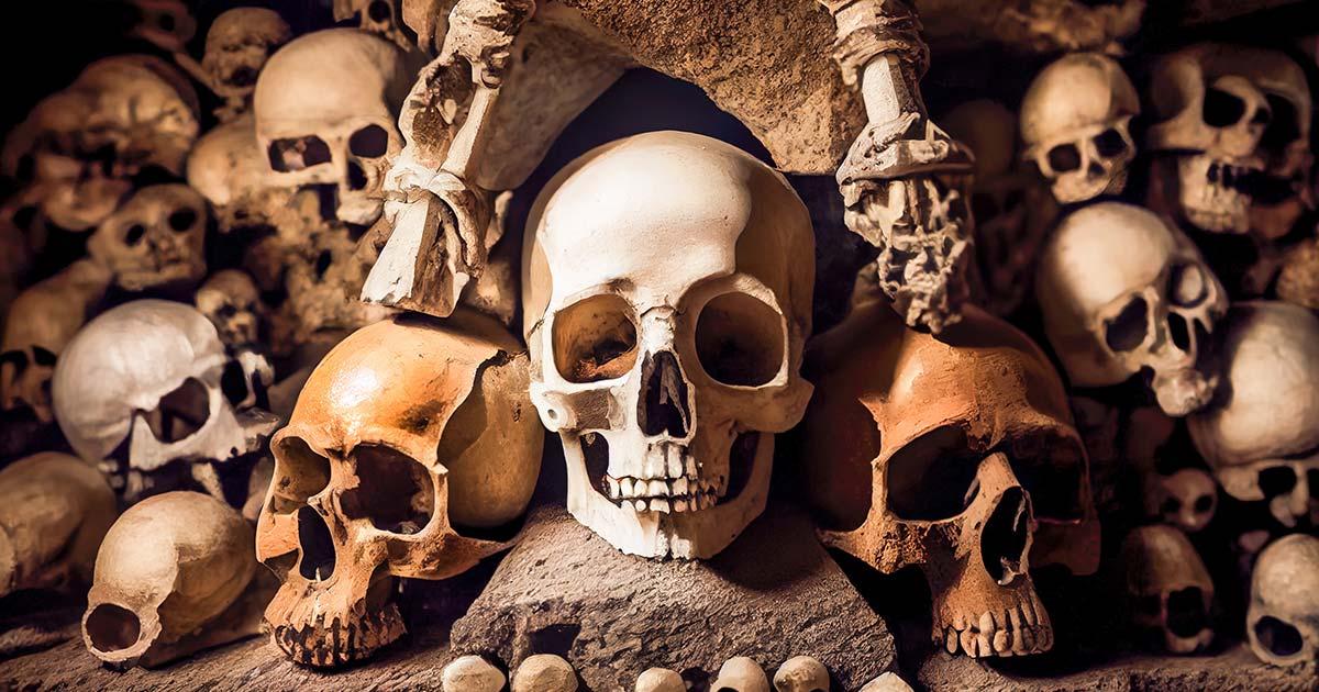 Representative image of human skulls in one of the famous catacombs around the world. Source: mila103 / Adobe Stock