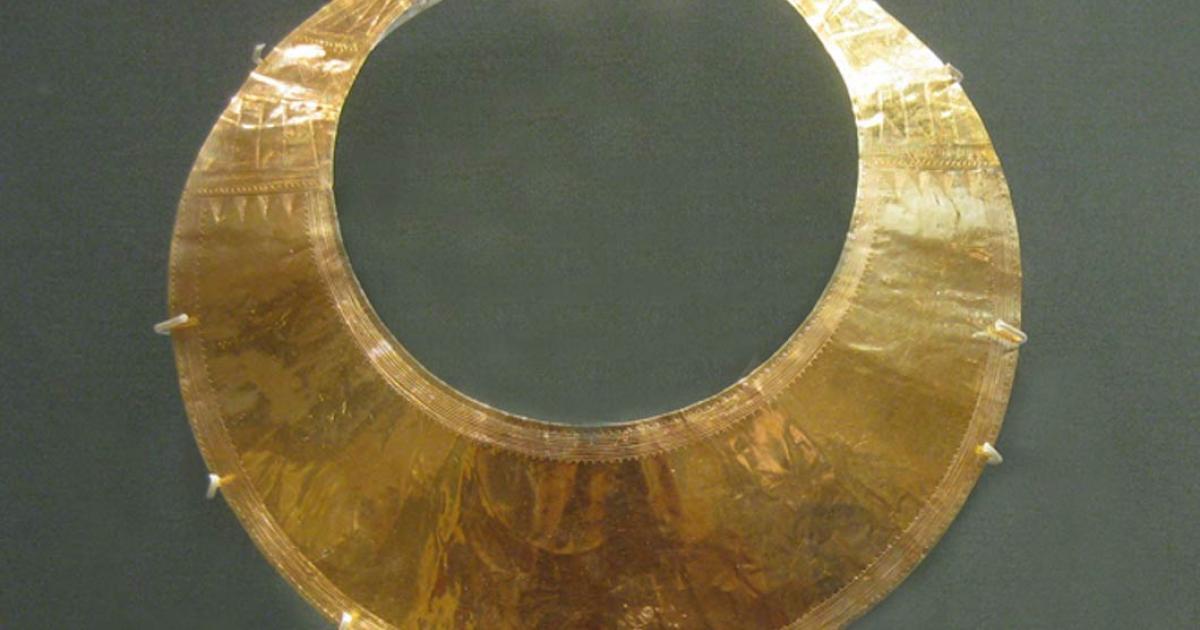 A gold lunula from County Wicklow. The piece, dating from 2400 BC to 2000 BC, is in the  British Museum. Note the decorations etched into the ends or horns of the lunula.