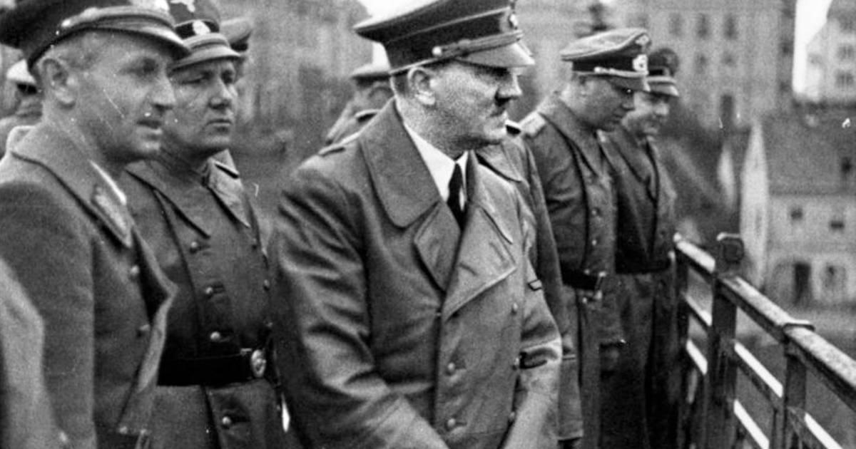 1941 picture of Adolph Hitler with several Nazi officials. On his immediate right is Martin Bormann, who was perhaps the most famous Nazi known to have escaped to South America after the war.