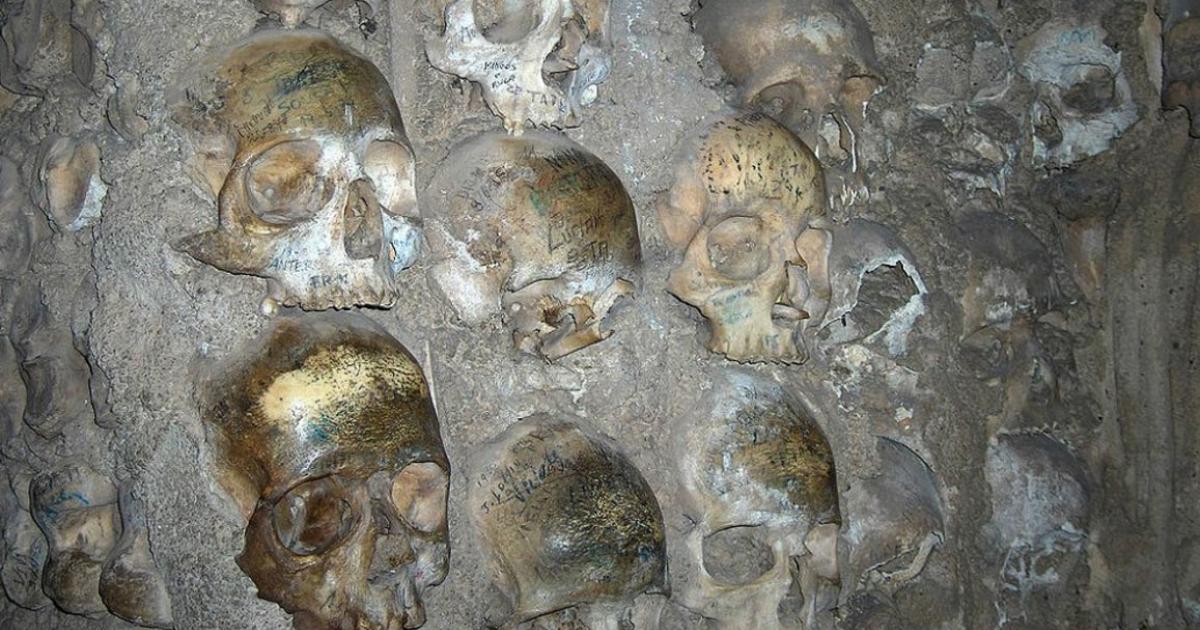 Close-up of human skulls that are part of the Chapel of Bones of the Church of San Francisco in Évora, Portugal. 