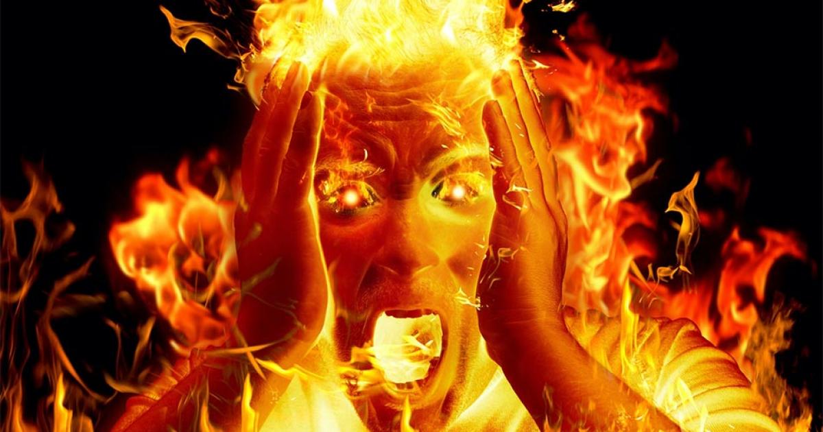 Man on fire showing representation of one of the victims at the Ball of the Burning Men (‘Bal des Ardents’)     Source: Daniele Depascale / Adobe stock