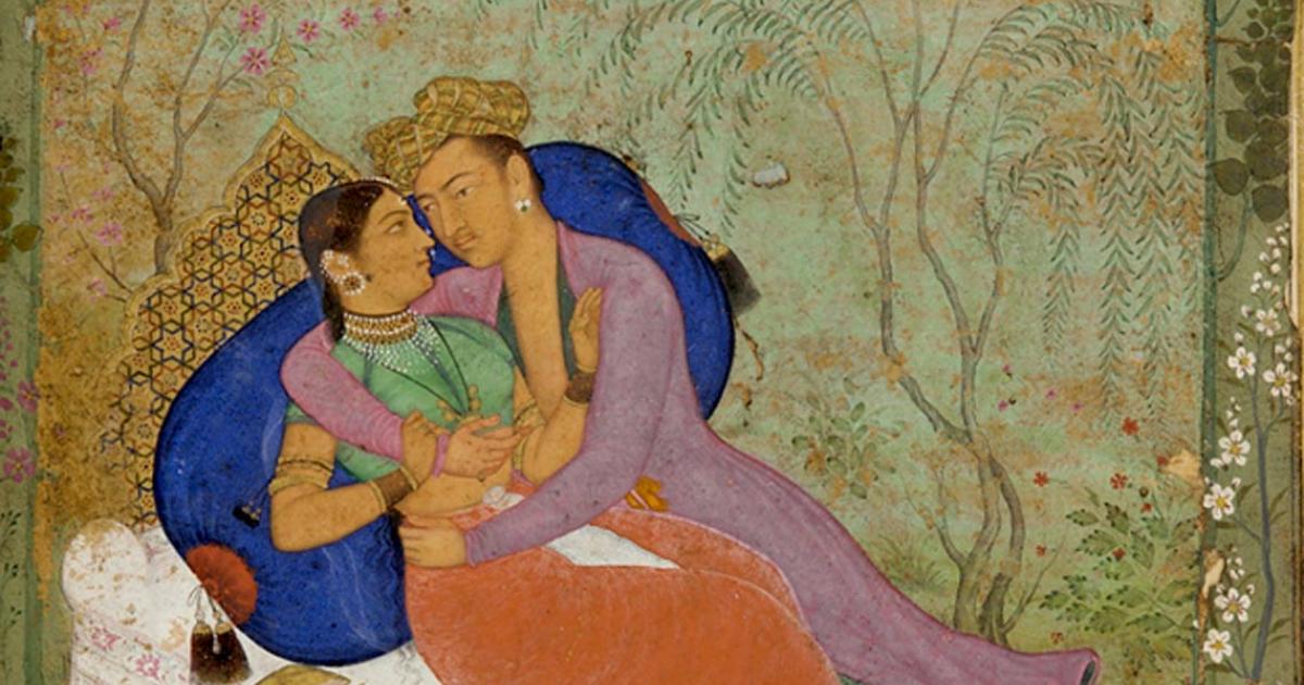 Kama Sutra couple on bed