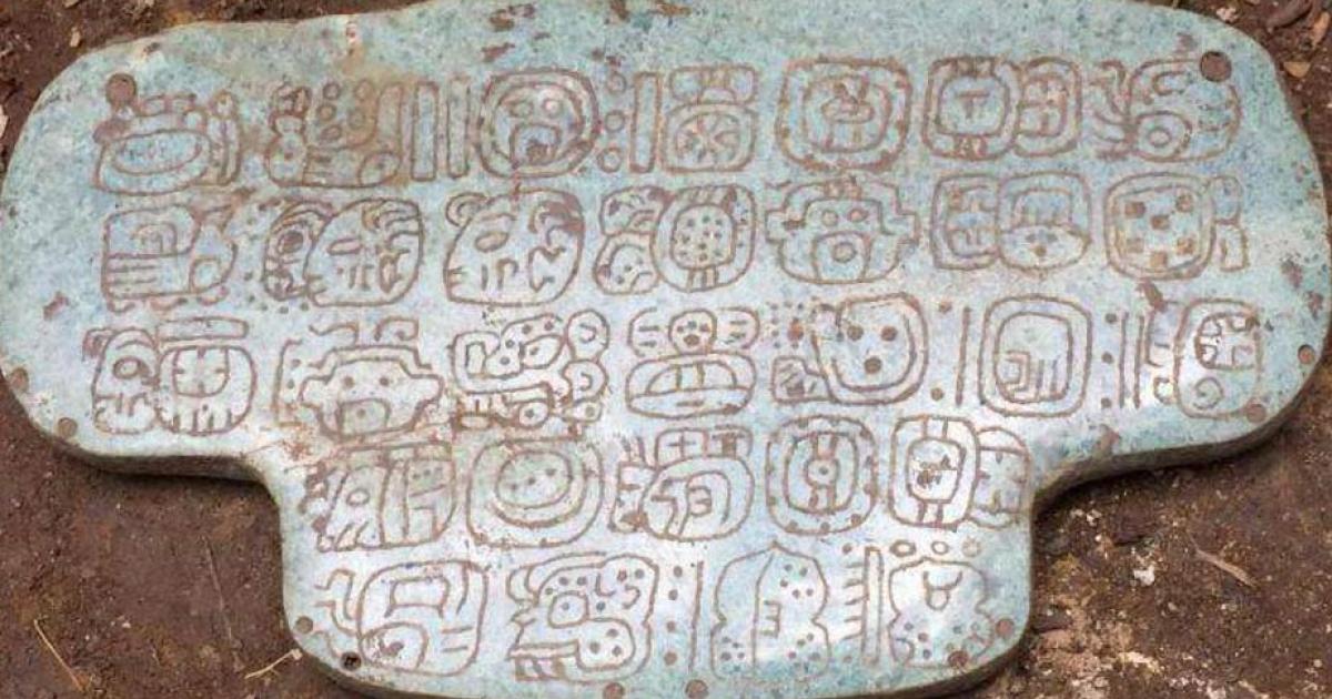 The newly-discovered jewel with 30 hieroglyphs on its back, a private message seen mostly by the king who wore it.