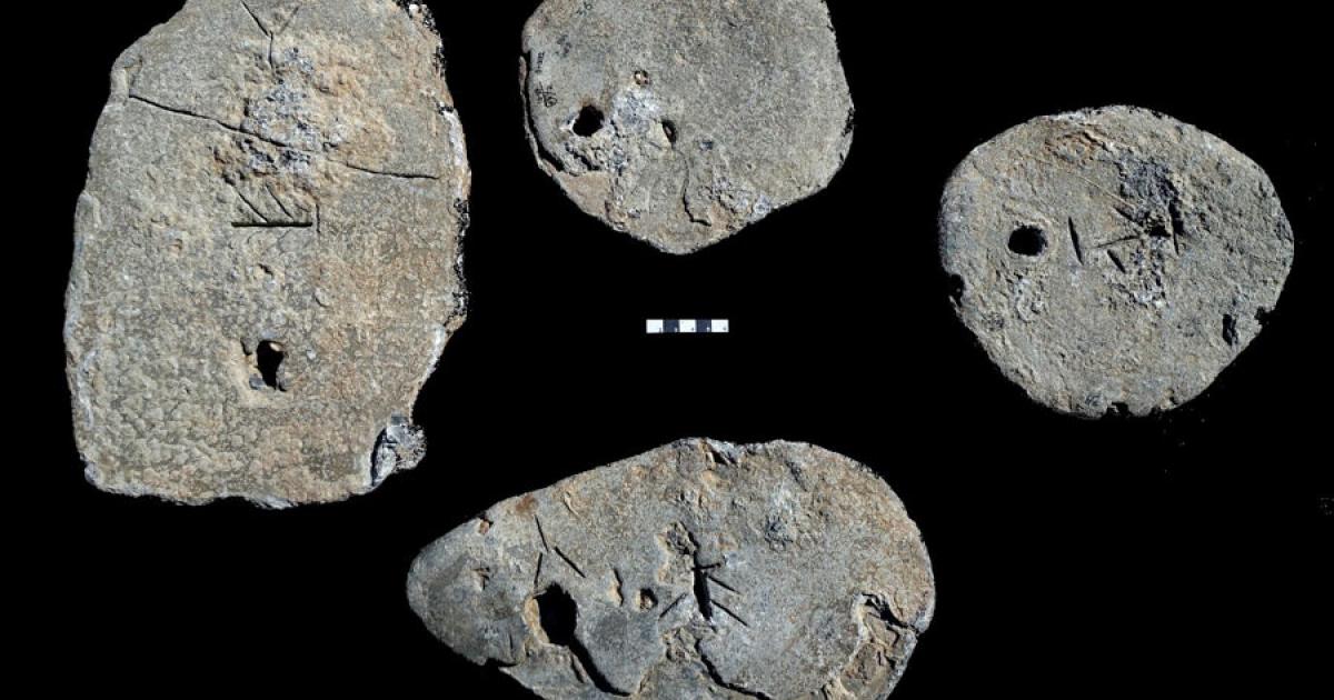  The four lead ingots discovered in a shipwreck off the coast of Israel. Source: Ehud Galili / University of Haifa’s Institute for Maritime Studies