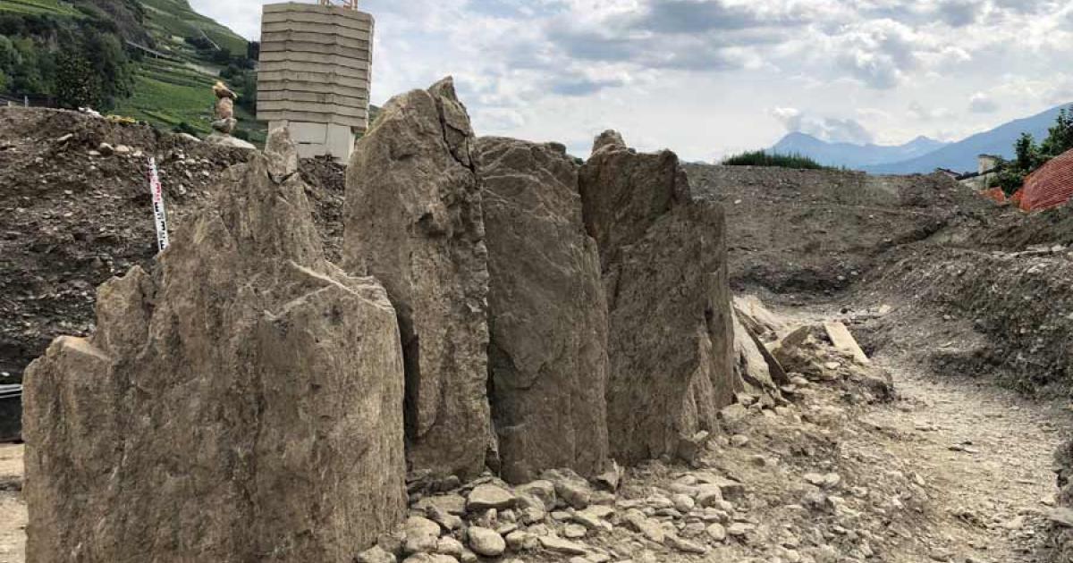 The recently discovered menhirs as they stood in the ground when discovered at Saint-Léonard, Switzerland.   Source: St-leonard.ch