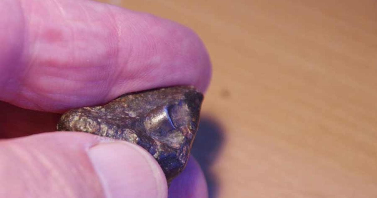 Anomalous Metallic Object Discovered Inside a 4.5 Billion-Year-Old Meteorite