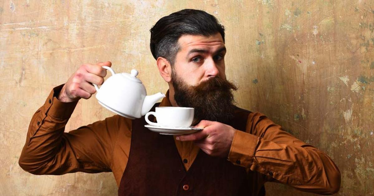 A gentleman and a moustache cup. Source: be free / Adobe Stock